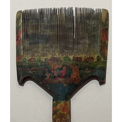 Старинная чесалка с народным сюжетом